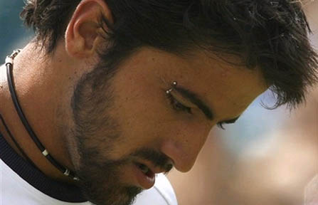The heavily-accessorized Janko Tipsarevic — with his piercings, tattoos, 