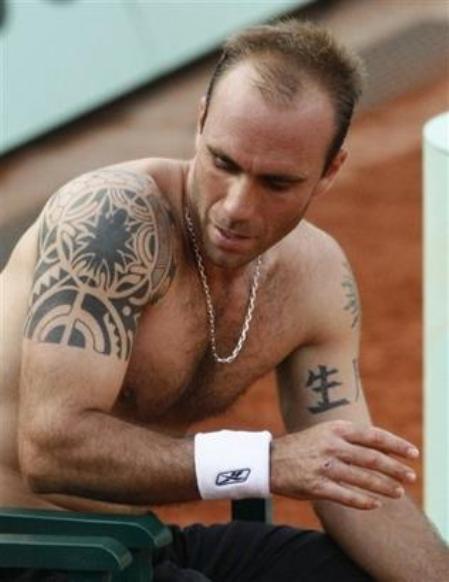 Tattoo Watch: the furrylicious Luis Horna lost to Gael Monfils 7-6 (5), 6-4, 
